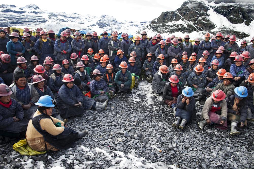 <p>Pallaqueras - women who select stones from the mine dumps - attend an afternoon briefing with their colleagues and the engineers of Corporacion Minera Ananea in La Rinconada, Peru.</p>