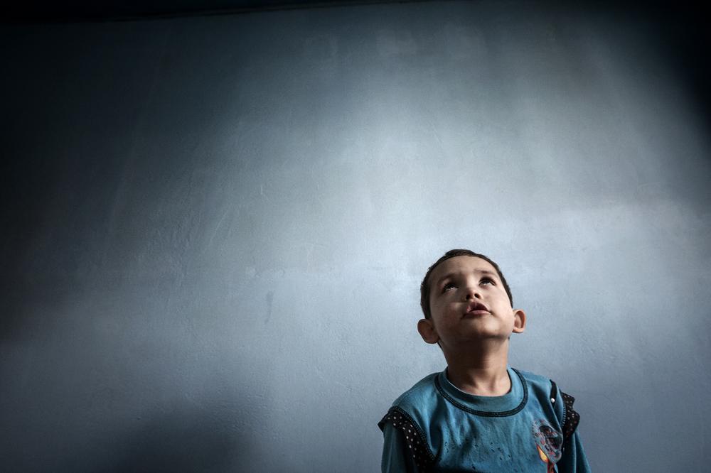 <p>Mobin is 5 years old. Here he raises his eyes to the ceiling in his house in Kabul - a typical gesture. Mobin was born with autism, and doesn’t understand the concept of danger. The family has taken him to see seven specialists, but nothing has changed. They all say that their son can’t be treated in Afghanistan and should be taken abroad. The family is concerned about Mobin’s future because Afghanistan has no educational services for autistic children. Mobin is a CCD beneficiary.</p>