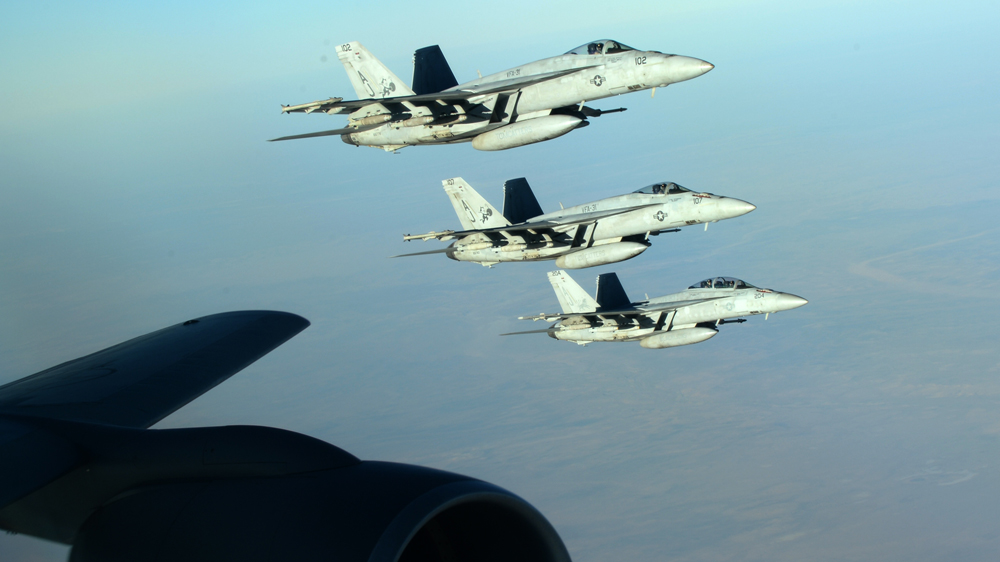 A handout picture released by the US Department of Defense shows a formation of US Navy F-18E Super Hornets over northern Iraq on September 23, 2014