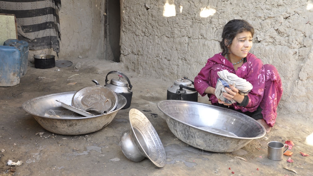 Afghan returnees' condition continue to worsen a year after the deadly 2014 attack on a school in Peshawar. [Fatima Faizi/Al Jazeera]
