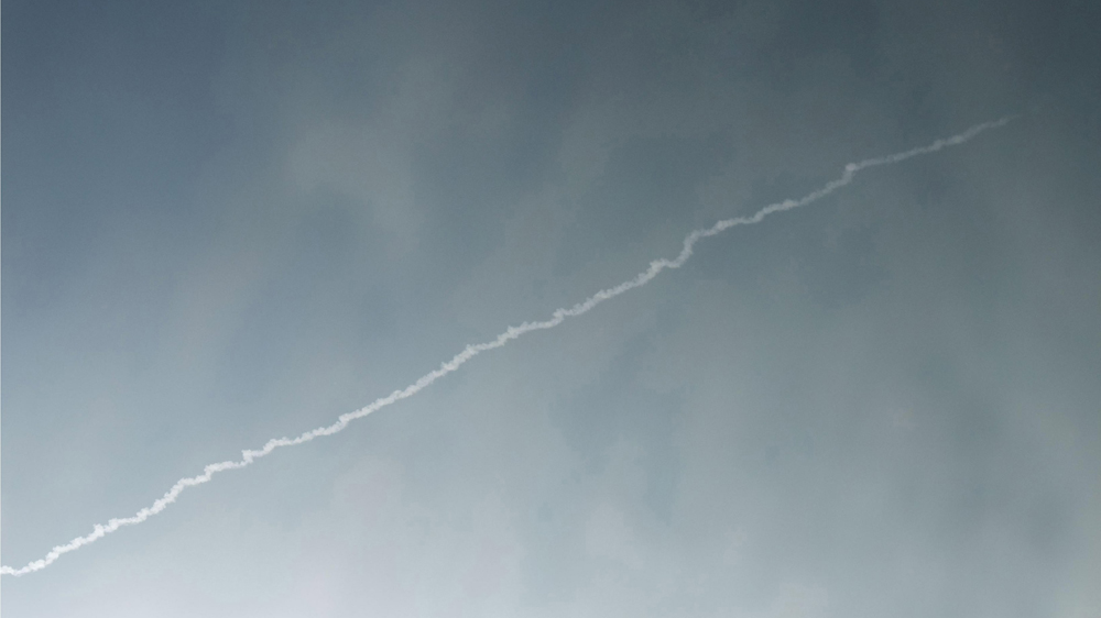 A flying object soared into the air above North Korean territory as seen from the Chinese border city of Dandong [Reuters]