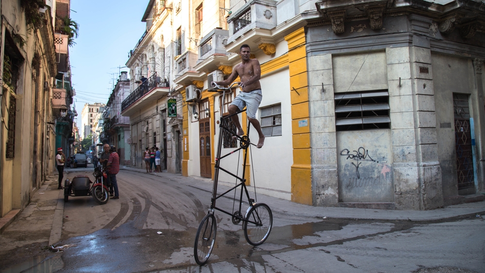 Guadalupe Guerrero, a Havanan filmmaker, frames the struggle Cubans face today within the country's rich history and culture. 'Cuba is an absurd country. An island of the surreal and the inexplicable. All you have to do is step outside and you'll be faced with situations you can't comprehend on a reasonable plane. In our Cubanhood - what binds us as Cuban - lies a roaring undercurrent of anti-logic,' he says [Tomas Ayuso/Al Jazeera]
