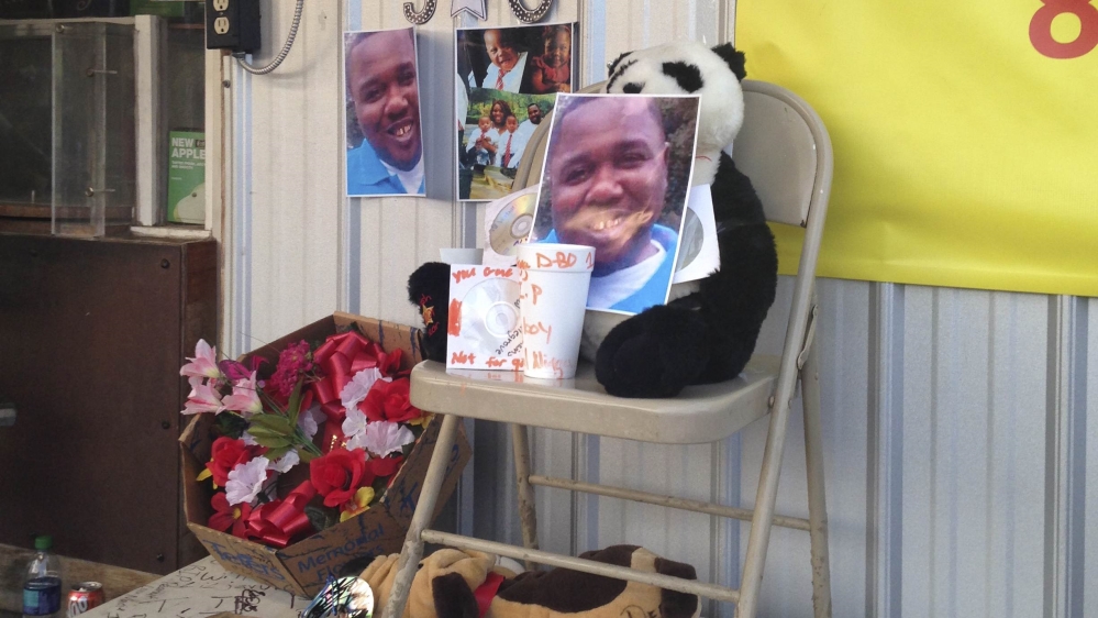 A community vigil in memory of Alton Sterling was held and tributes poured from friends and family [Jeffrey Dubinsky/Reuters]
