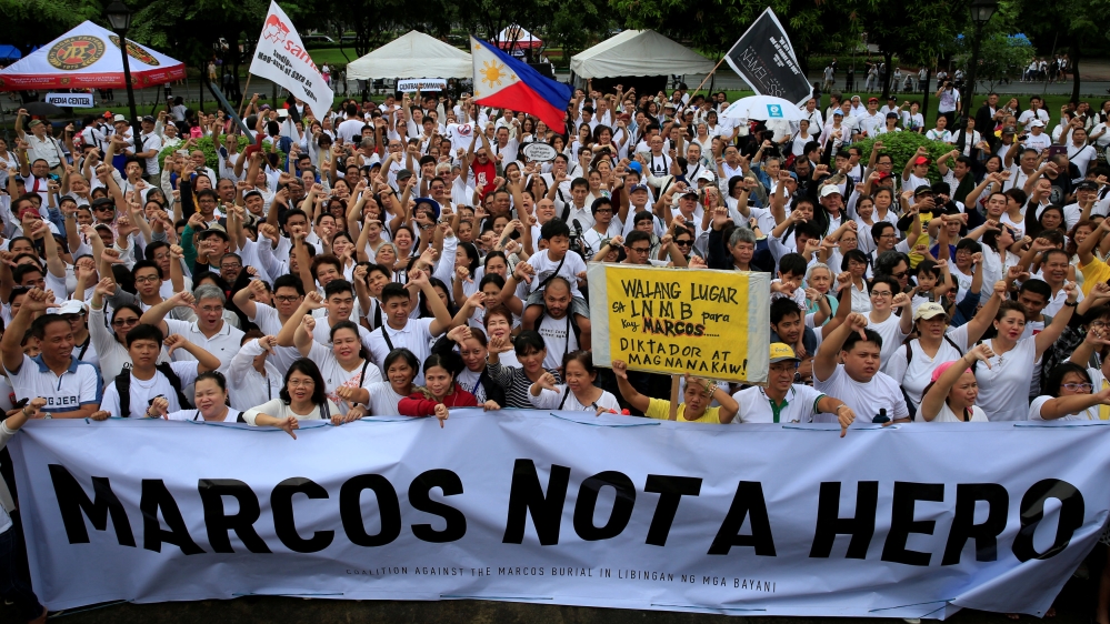 Marcos was elected president in 1965 and declared martial law in 1972 [Romeo Ranoco/Reuters]