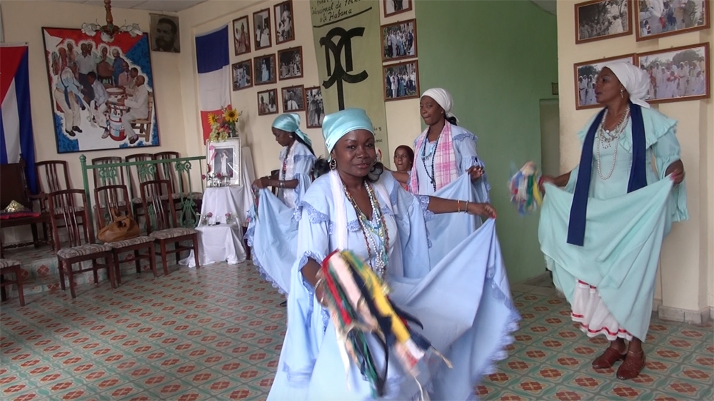  The costumes of the Cuban dance known as tumba frances evoke the elegant ballgowns of bygone Haiti [Sylvia Hines/Al Jazeera]