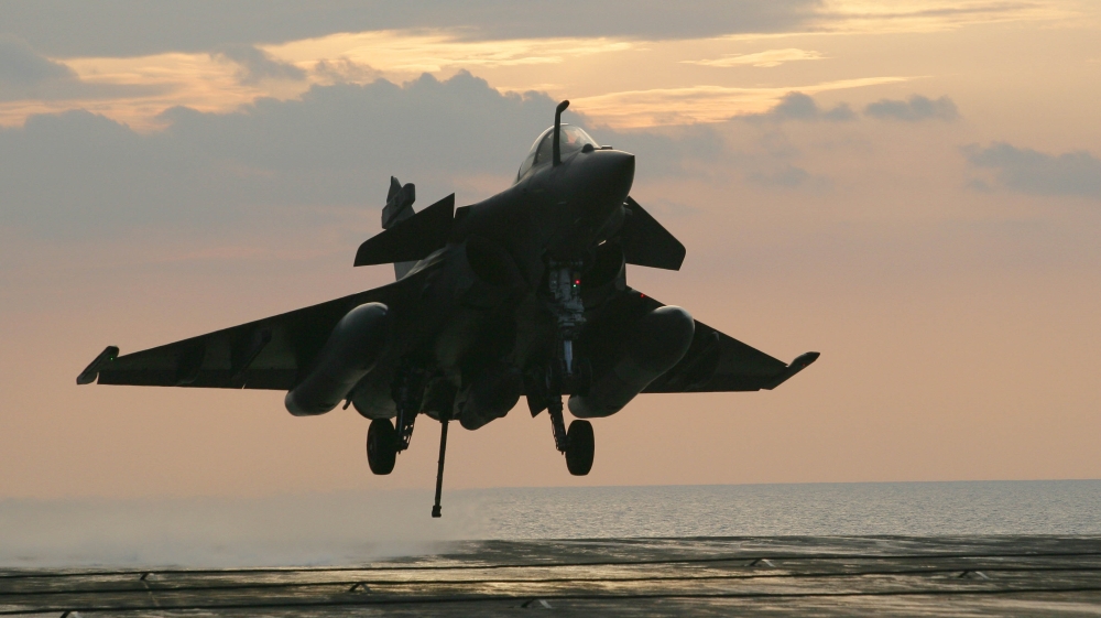 A French Navy Rafale jet fighter prepares to land on the Charles de Gaulle aircraft carrier on April 20, 2011 in the Mediteranean sea, as part of the military operations of the Nato coalition in Libya