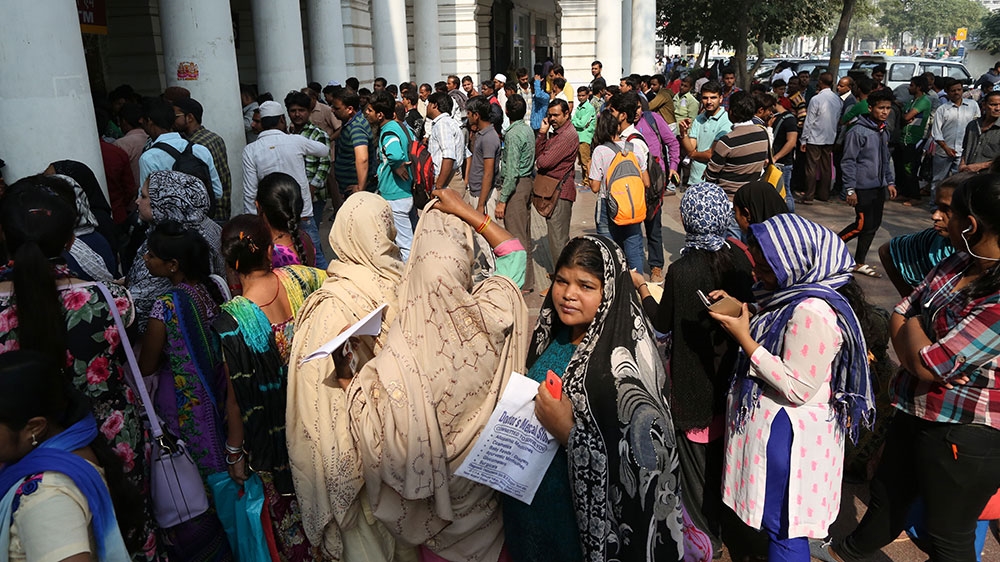 The old tenders of 500 ($7.73) and 1,000 rupees ($15.45) became illegal within hours of Modi's announcement last November [Showkat Shafi/Al Jazeera]