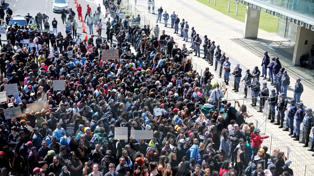 Protesters tried to storm the conference centre in Cape Town, where the WEF conference was being held