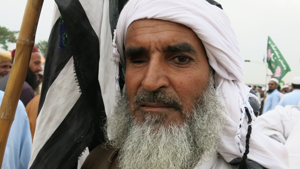 Allah Baksh, 60, travelled more than 1,000km (621 miles) to attend the protests saying he was motivated because he believes Imran Khan supports a religious minority Baksh considers to be heretics