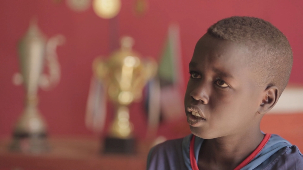 Eissa follows in the footsteps of his brother, Al-Fatih Adam, who began playing football when there were even less resources available. [Al Jazeera]