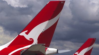Qantas plans to outsource its Australian ground-handling operations as part of a cost-cutting move