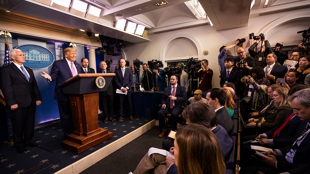 President Donald Trump with Vice President Mike Pence and members of the president’s coronavirus taskforce speaks during a news conference at the Brady press briefing room of the White House