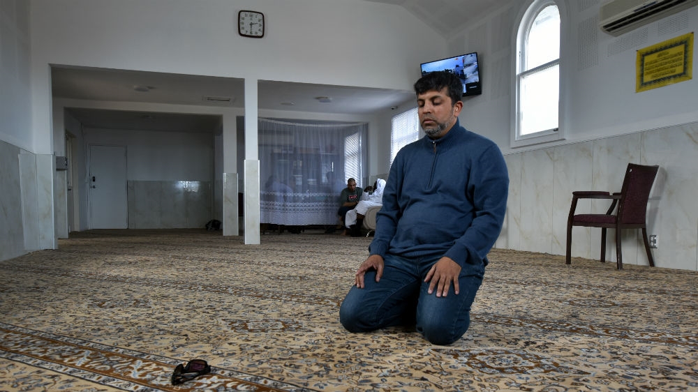 Mazhar Syed Ahmed prays inside the Linwood Islamic Centre, on a day Friday in late February