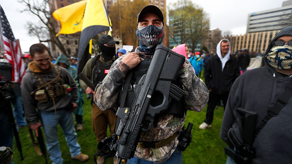 A protester at the state capitol in Lansing, Michigan