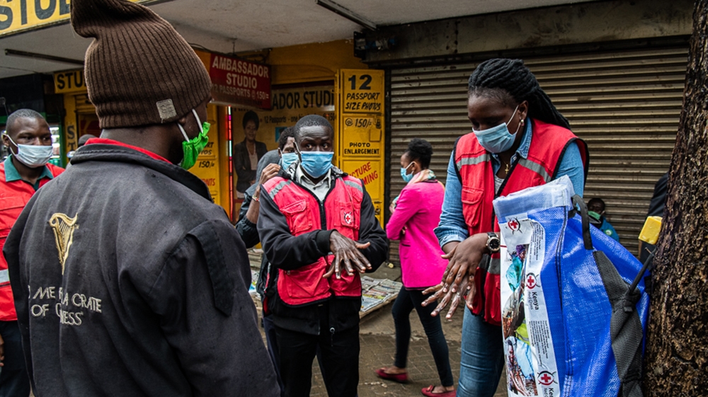 Red Cross Kenya volunteers raising COVID-19 awareness in