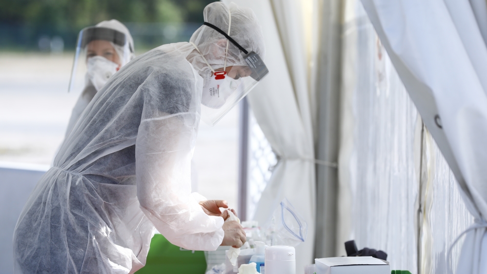 Health officials at a testing station at Festplatz, Mitte, Berlin, Germany