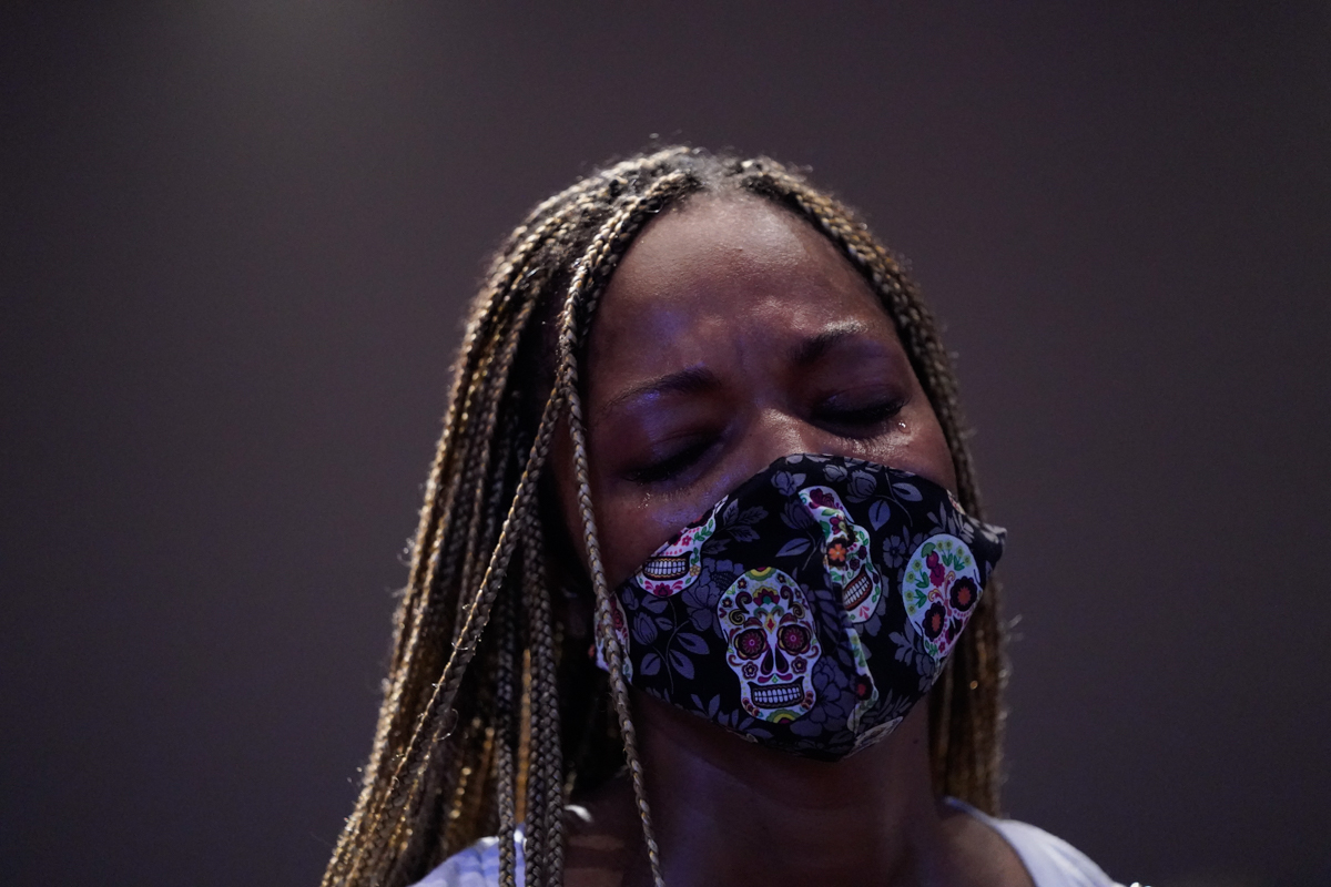 HOUSTON, TEXAS - JUNE 08: Mourners pass by the casket of George Floyd during a public visitation at the Fountain of Praise church on June 8, 2020 in Houston, Texas. Floyd died after being restrained b