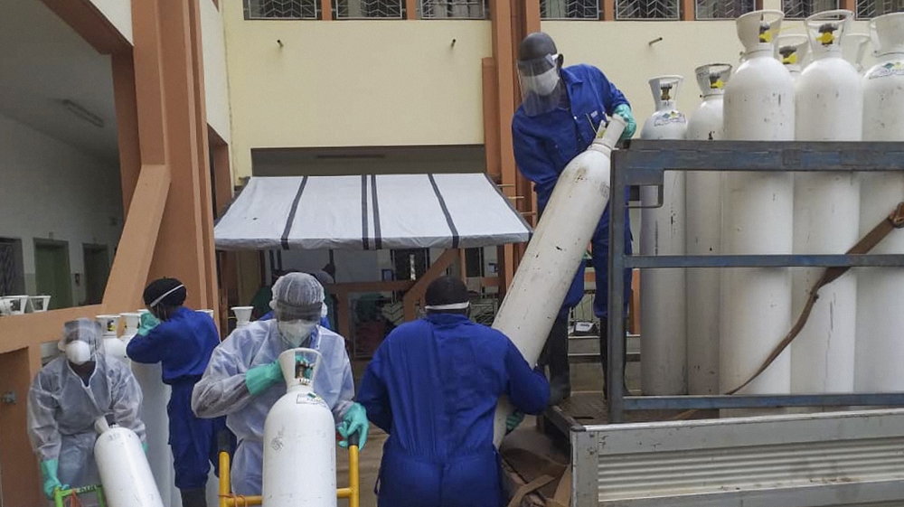Kenyan nurses wear protective gear during a demonstration of preparations for any potential coronavirus cases at the Mbagathi Hospital, isolation centre for the disease, in Nairobi