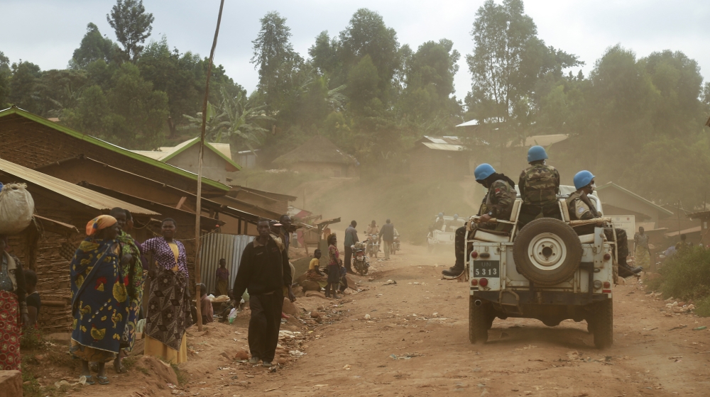 In this photograph taken on March 13, 2020, Moroccan soldiers from the UN mission in DRC (Monusco) ride in a vehicle as they patrol in the violence-torn Djugu territory, Ituri province, eastern DRCong