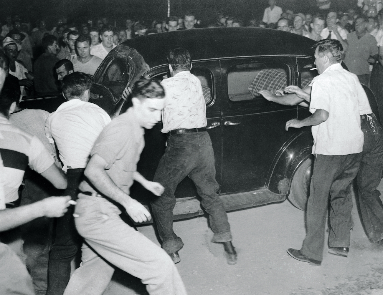 Townspeople blocked cars and hurled rocks and epithets at concertgoers on August 27 in Peekskill; Paul Robeson’s concert would be rescheduled to September 4, when larger riots would break out