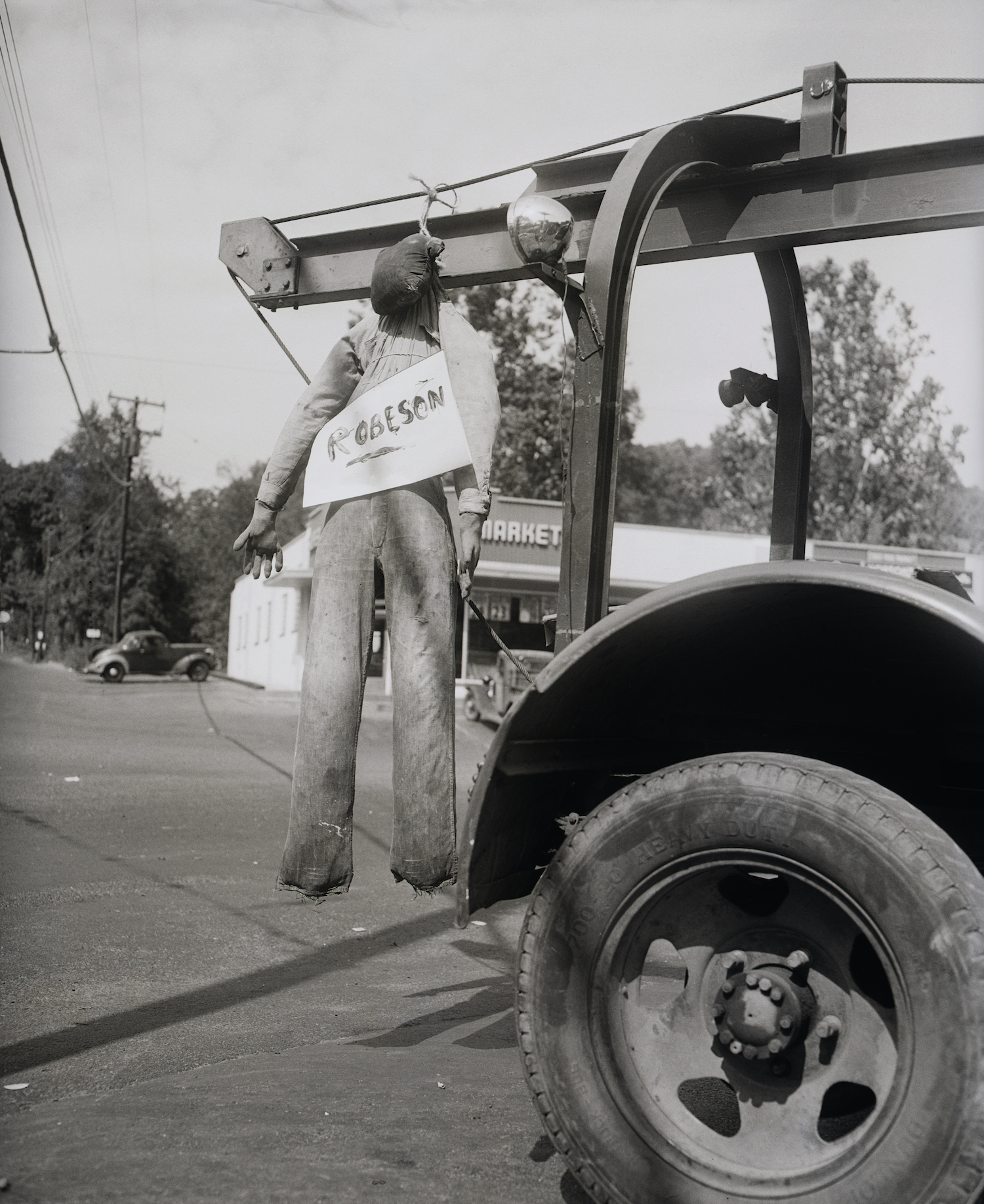 A lynched effigy hangs on the rear of a tow truck in Peekskill on September 4, 1949