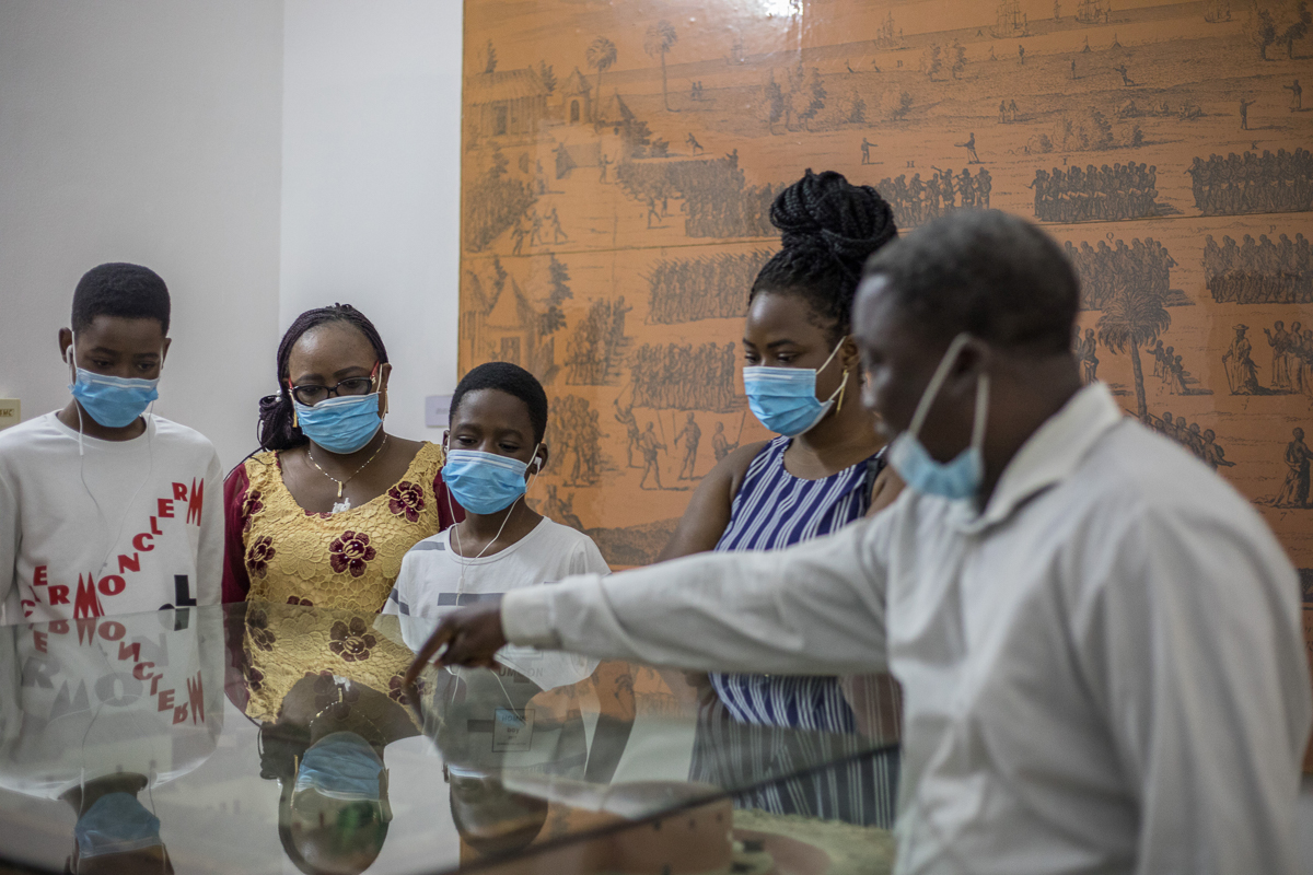 Visitors are seen at the Ouidah''s Brazil House in Ouidah on August 4, 2020. - As western cities see statues of slaveholders and colonialists toppled, Benin''s coastal town of Ouidah is restoring its ow