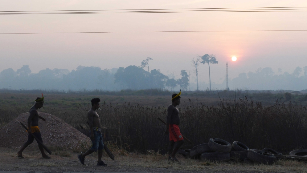 Kayapo Indigenous people walking on Brazil’s BR 163 national highway blocked during a protest against the government measures in the Indigenous lands in Novo Progresso, Para state, Brazil