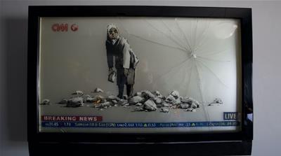 Banksy began his career spray-painting buildings in Bristol, England, and has become one of the world’s best-known artists