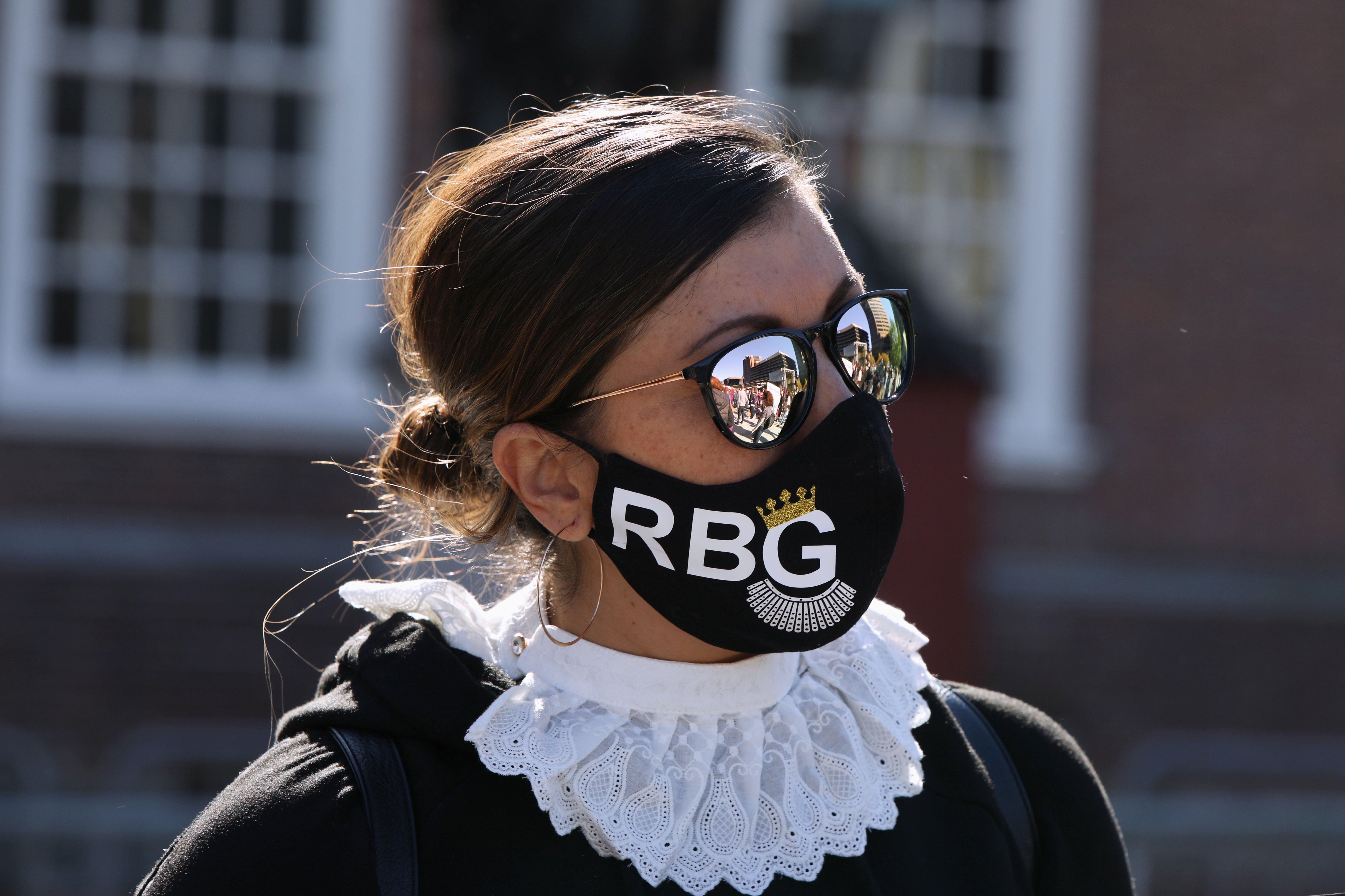 A woman dressed as Justice Ruth Bader Ginsburg participates in a Women’s March as part of a nationwide protest against President Donald Trump’s Supreme Court nominee, in Philadelphia, Pennsylvania