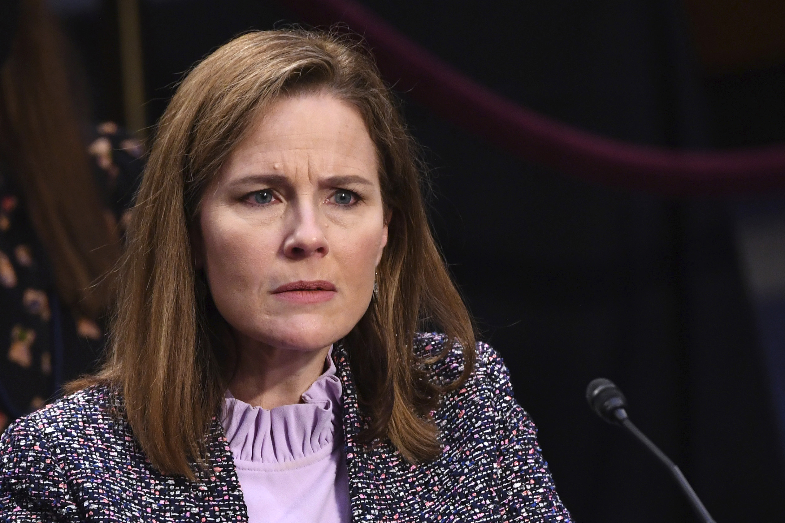 Supreme Court nominee Amy Coney Barrett listens during a confirmation hearing before the Senate Judiciary Committee, Wednesday, October 14, 2020, on Capitol Hill in Washington, DC
