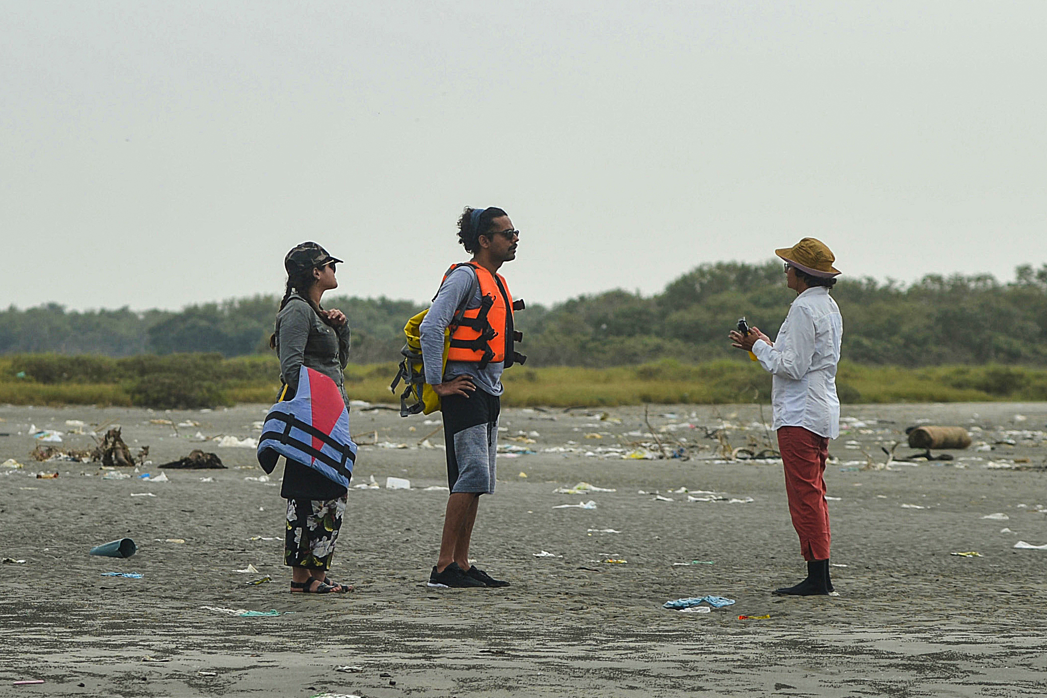 Mahera Omar, an environmental filmmaker, speaks with her team on Bundle Island off the coast of Karachi in October 2020