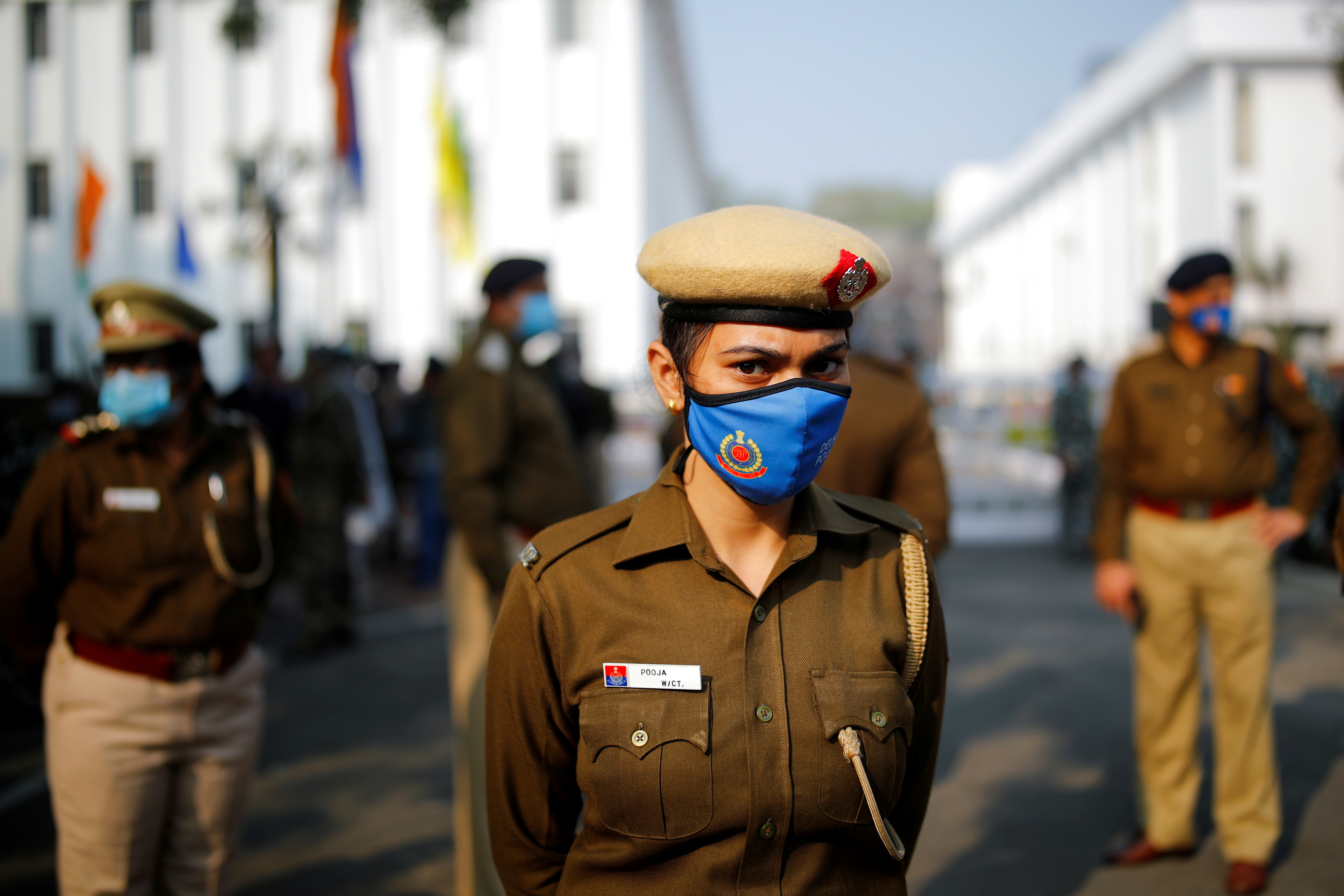 Police guard the venue where farmer leaders met government representatives in New Delhi, India