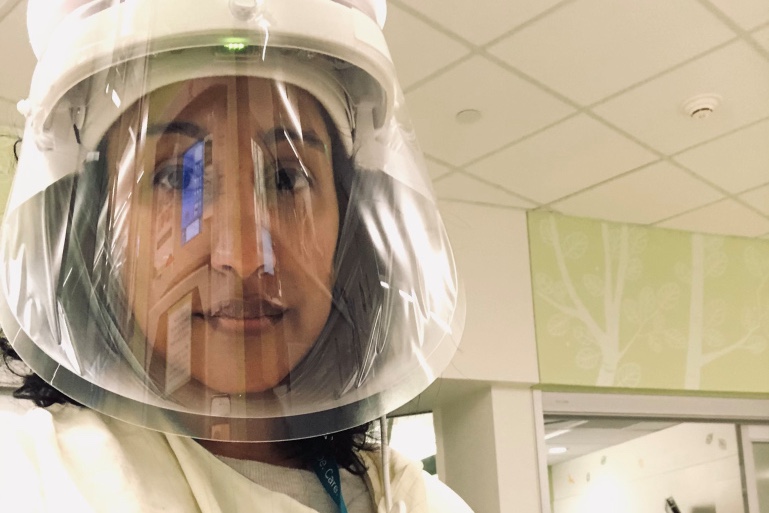 The writer wears PPE at work at a hospital in Seattle [Photo courtesy of Sabreen Akhter]