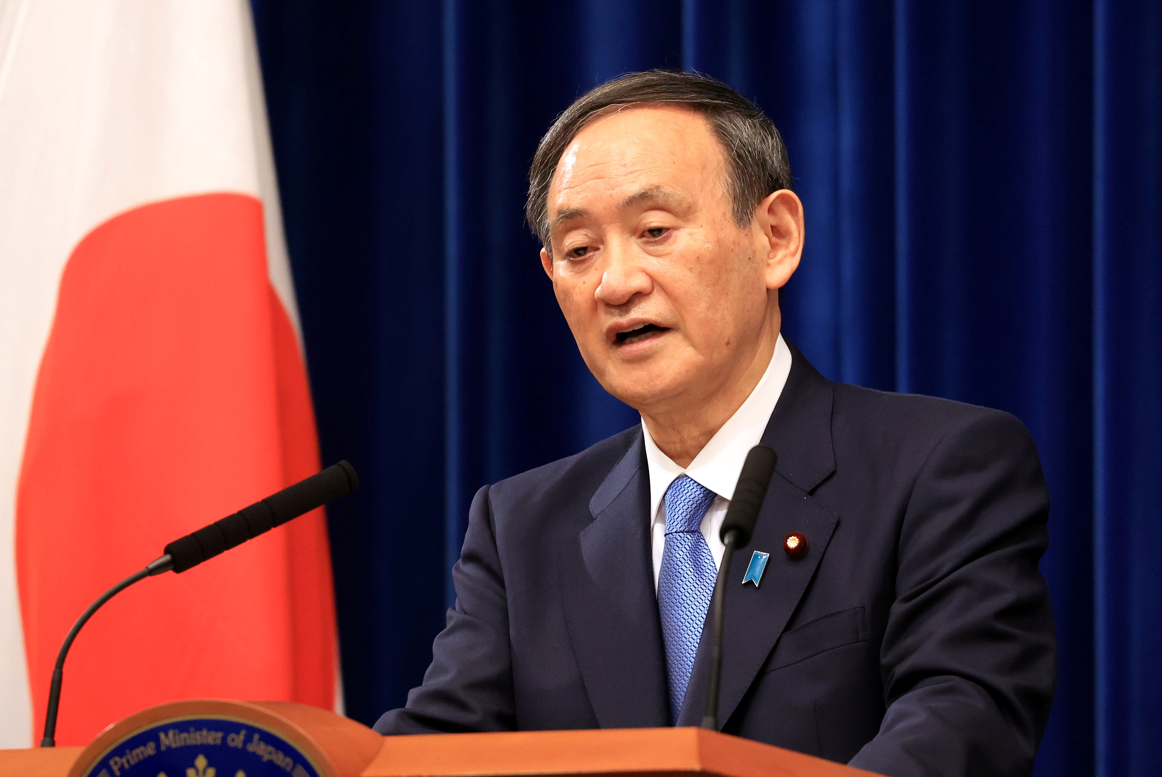 Japanese Prime Minister Yoshihide Suga holds a New Year’s press conference at his official residence in Tokyo on January 4, 2021