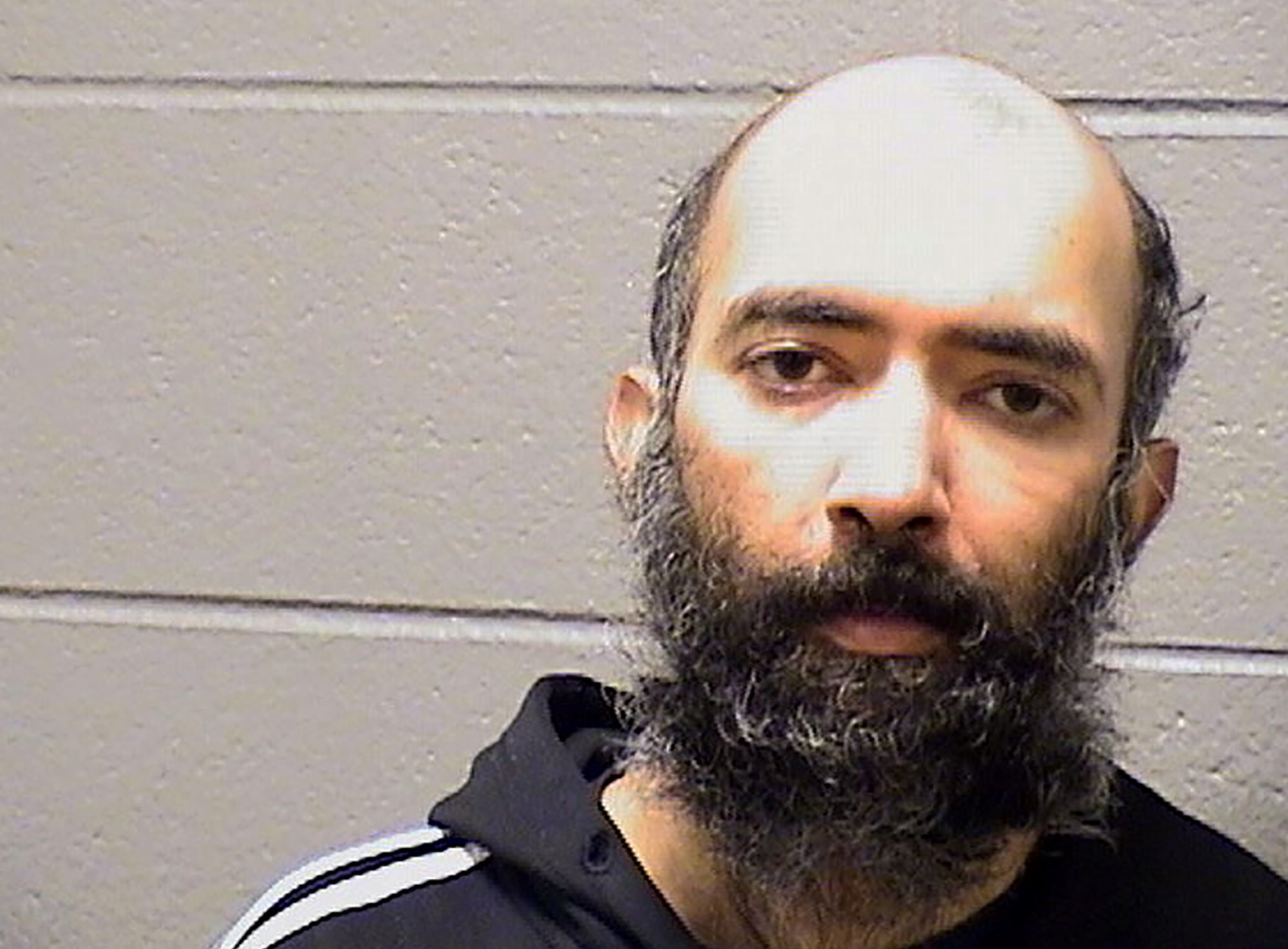 This Saturday, January 16, 2021, booking photo provided by the Cook County Sheriff’s Office shows Aditya Singh who was arrested on charges that he hid in a secured area at Chicago’s O’Hare International Airport for three months [Cook County Sheriff’s Office via AP]