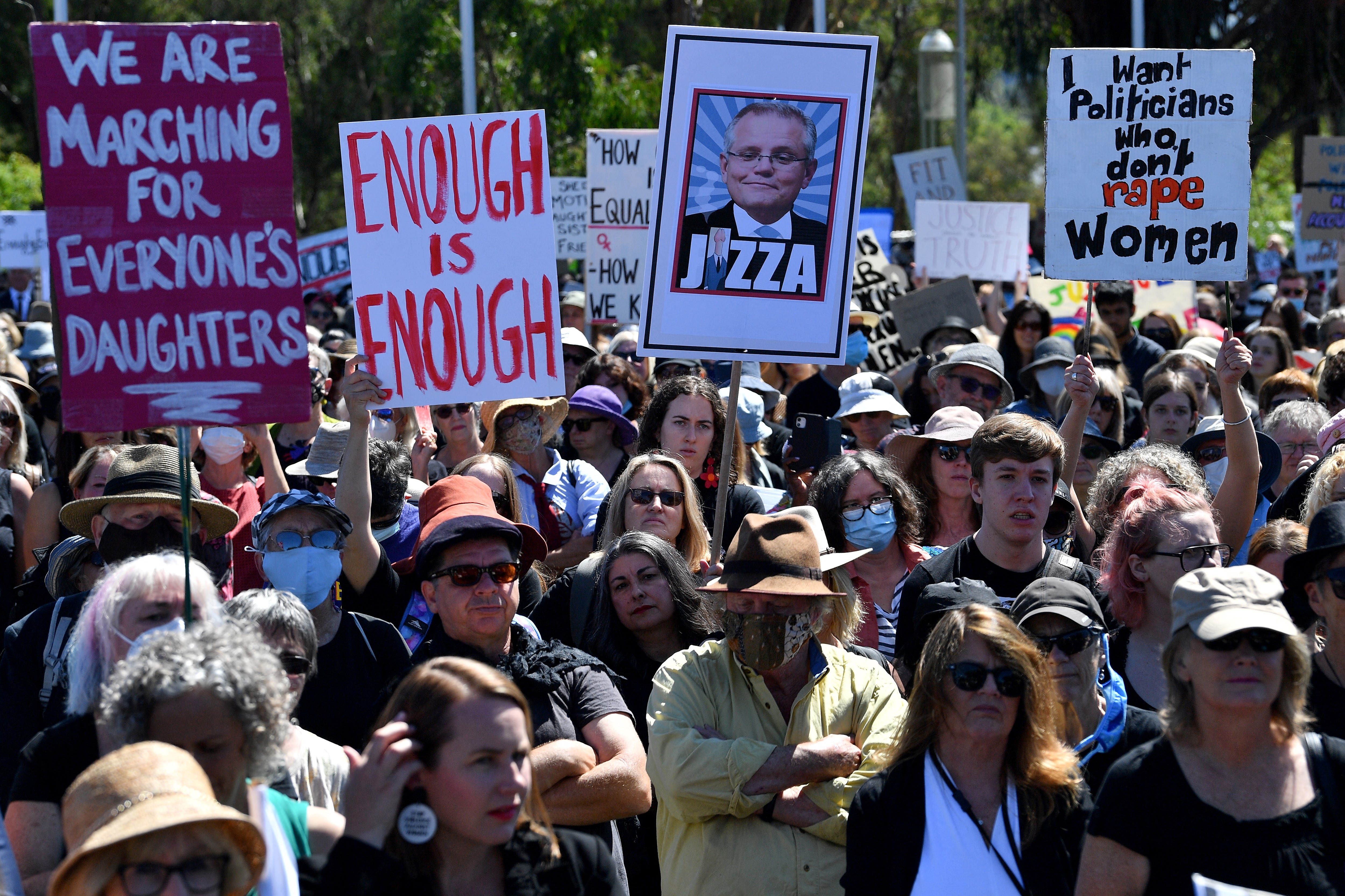 Protesters attend a rally against sexual violence and gender inequality in Australia’s capital city Canberra on March 15, 2021