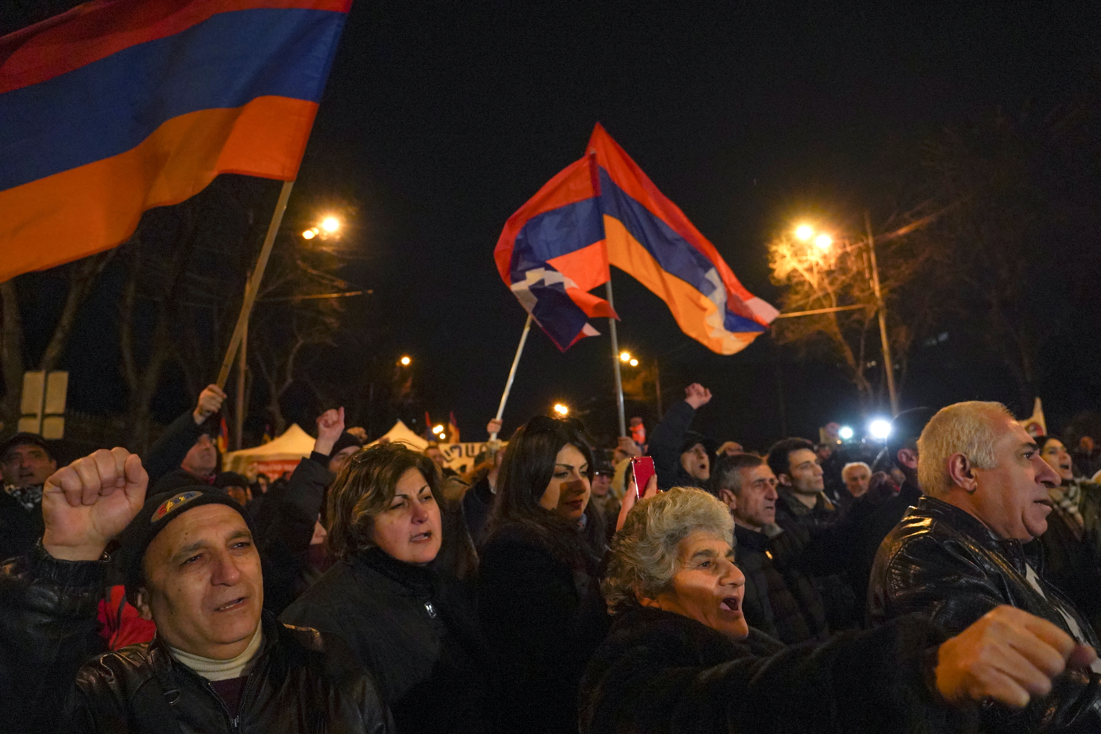 People attend an opposition rally to demand the resignation of Armenian Prime Minister Nikol Pashinyan in Yerevan, Armenia on March 1, 2021
