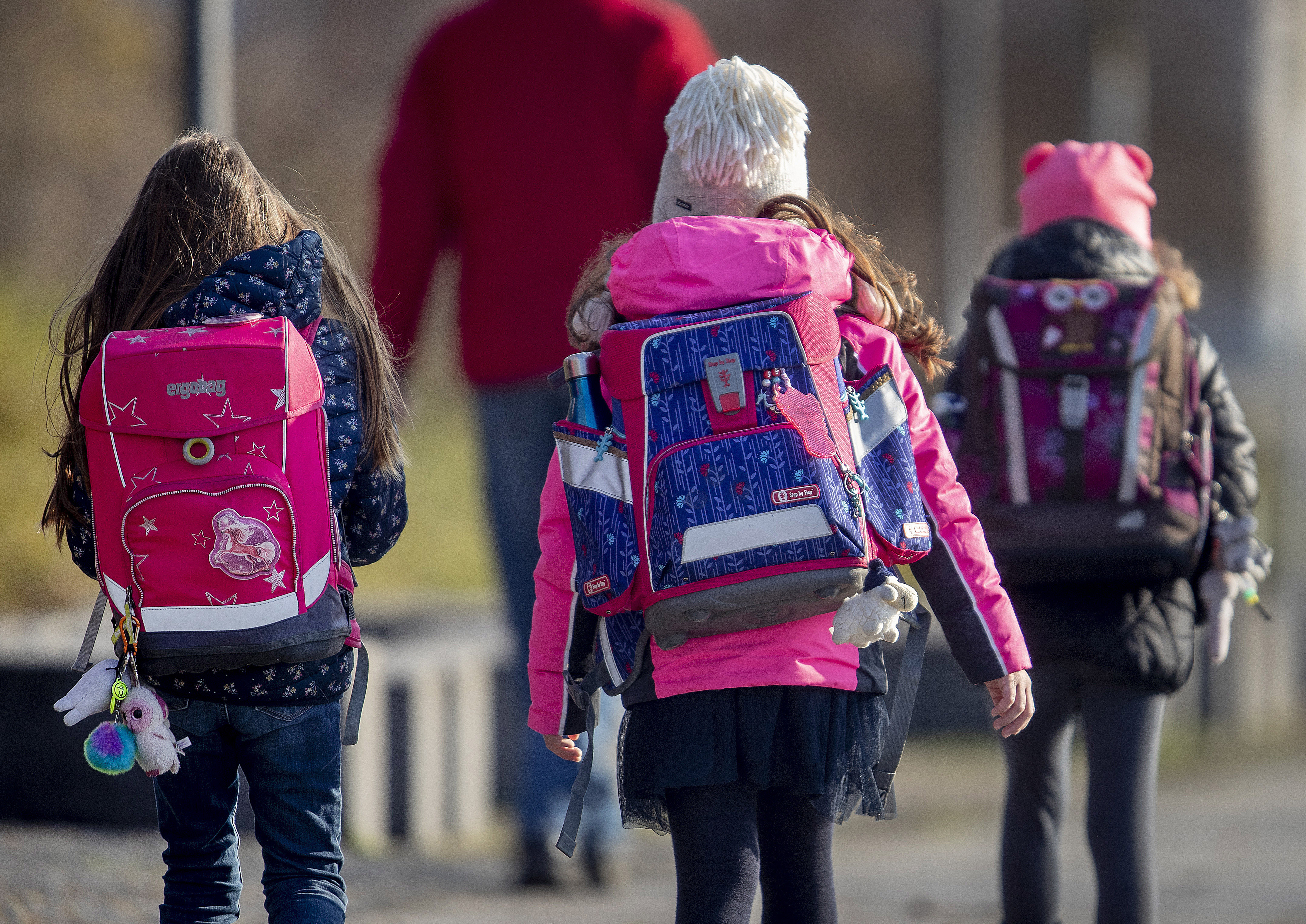 Girls go to school in Frankfurt, Germany on March 19, 2021 [AP/Michael Probst]