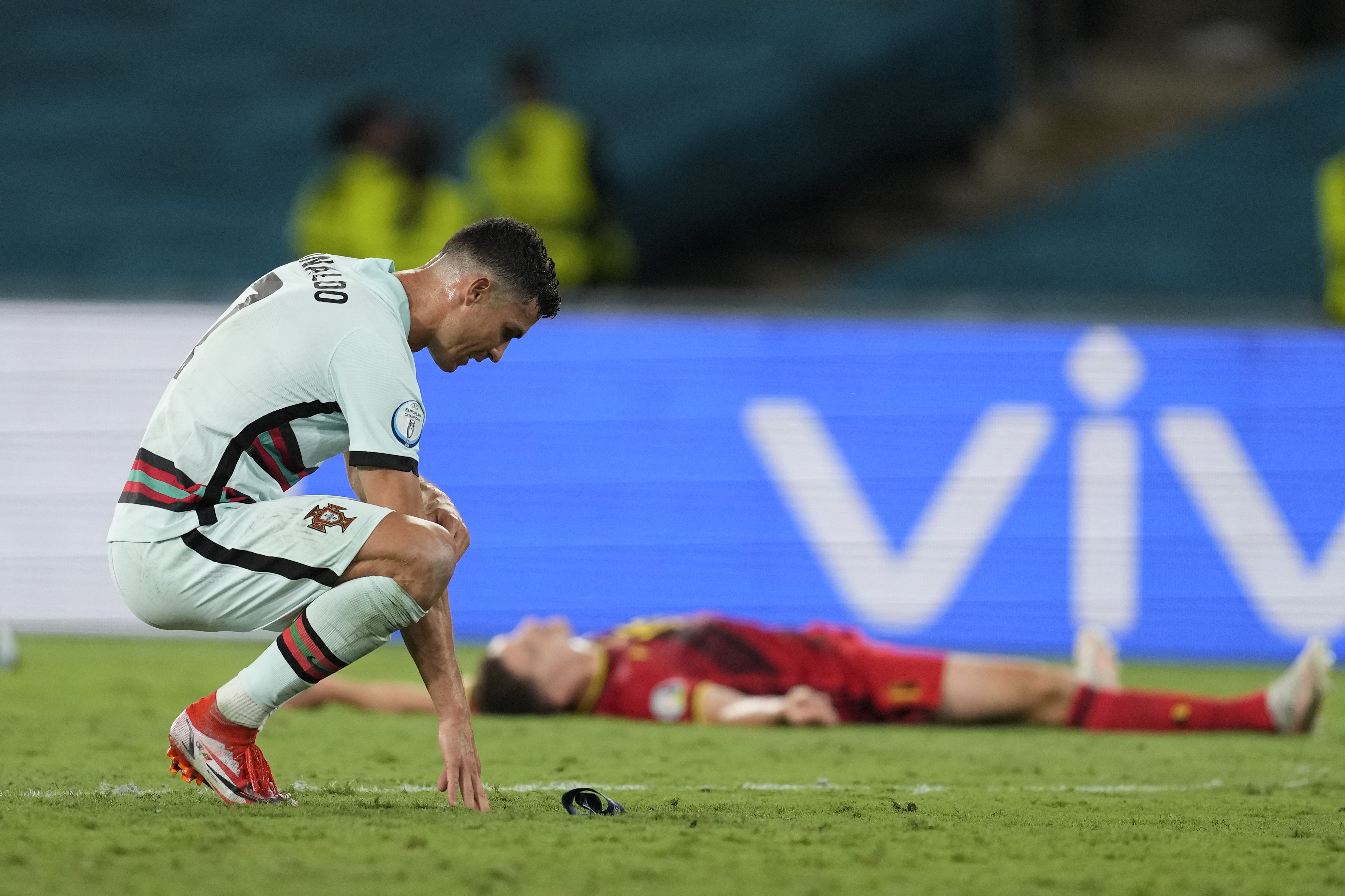 Portugal forward Cristiano Ronaldo reacts to the defeat in the EURO 2020 round of 16 match against Belgium