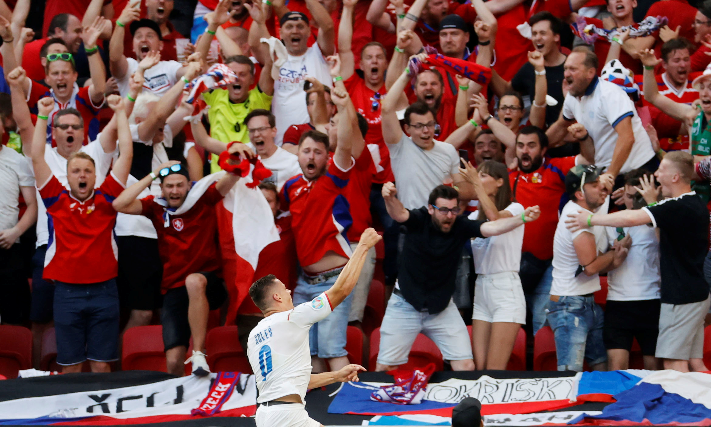 The Czech Republic’s Tomas Holes celebrates scoring their first goal