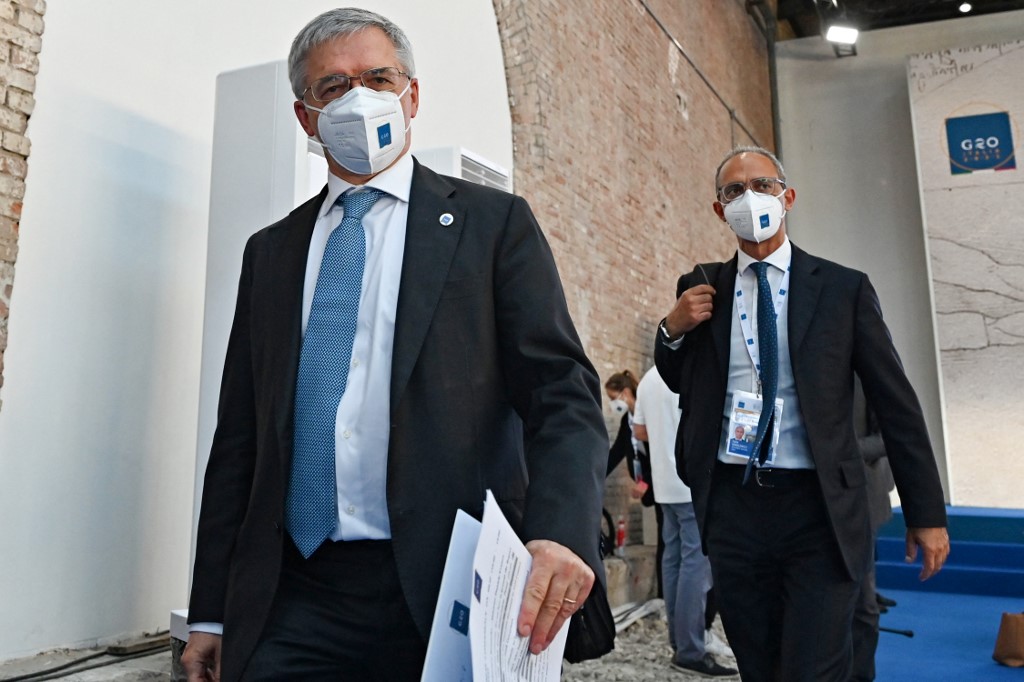 Italy’s Minister of Economy and Finance Daniele Franco leaves the press conference of the G20 High Level Independent Panel