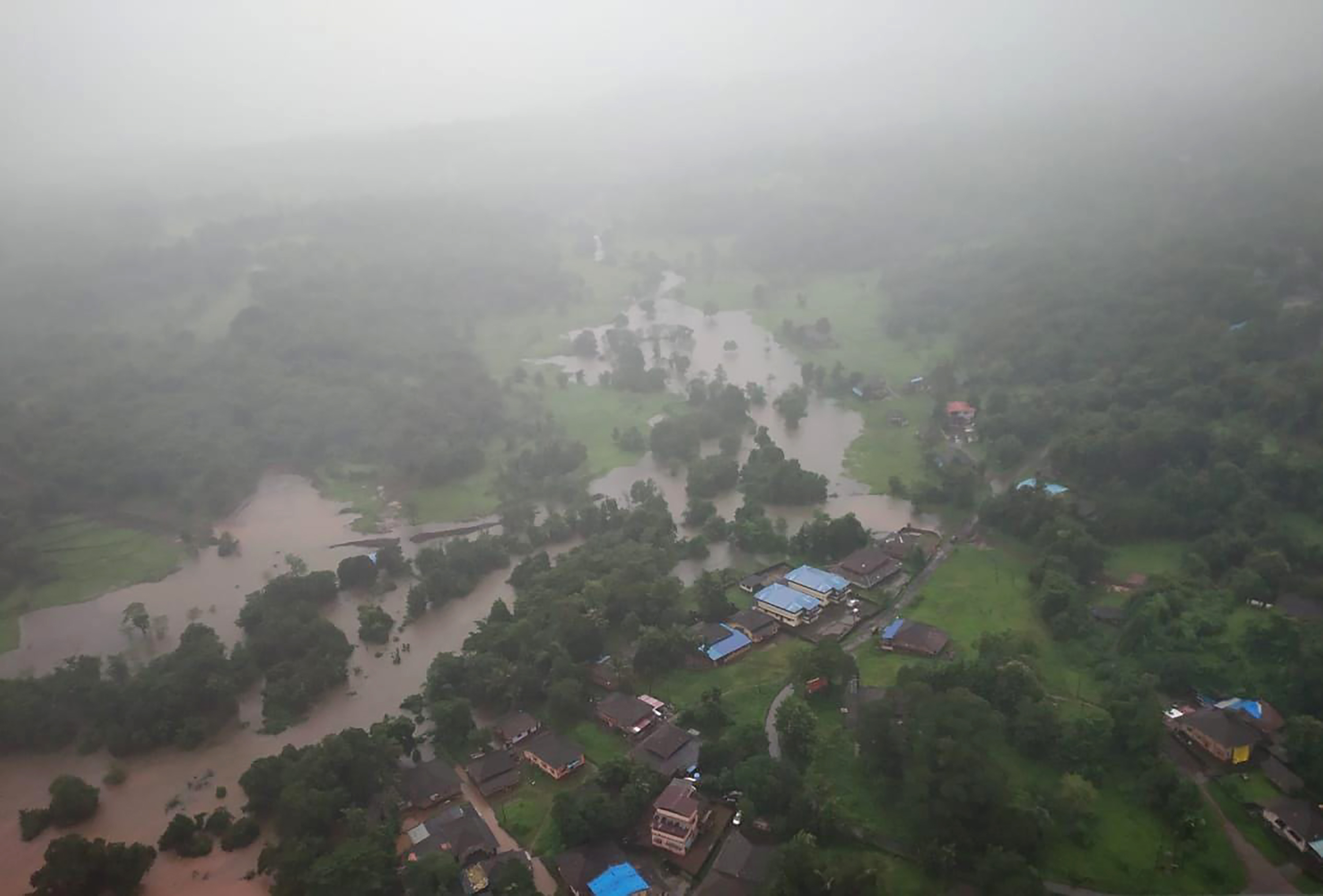This photograph provided by Indian Air Force shows flooding in Ratnagiri district, Maharashtra [Indian Air Force via AP]
