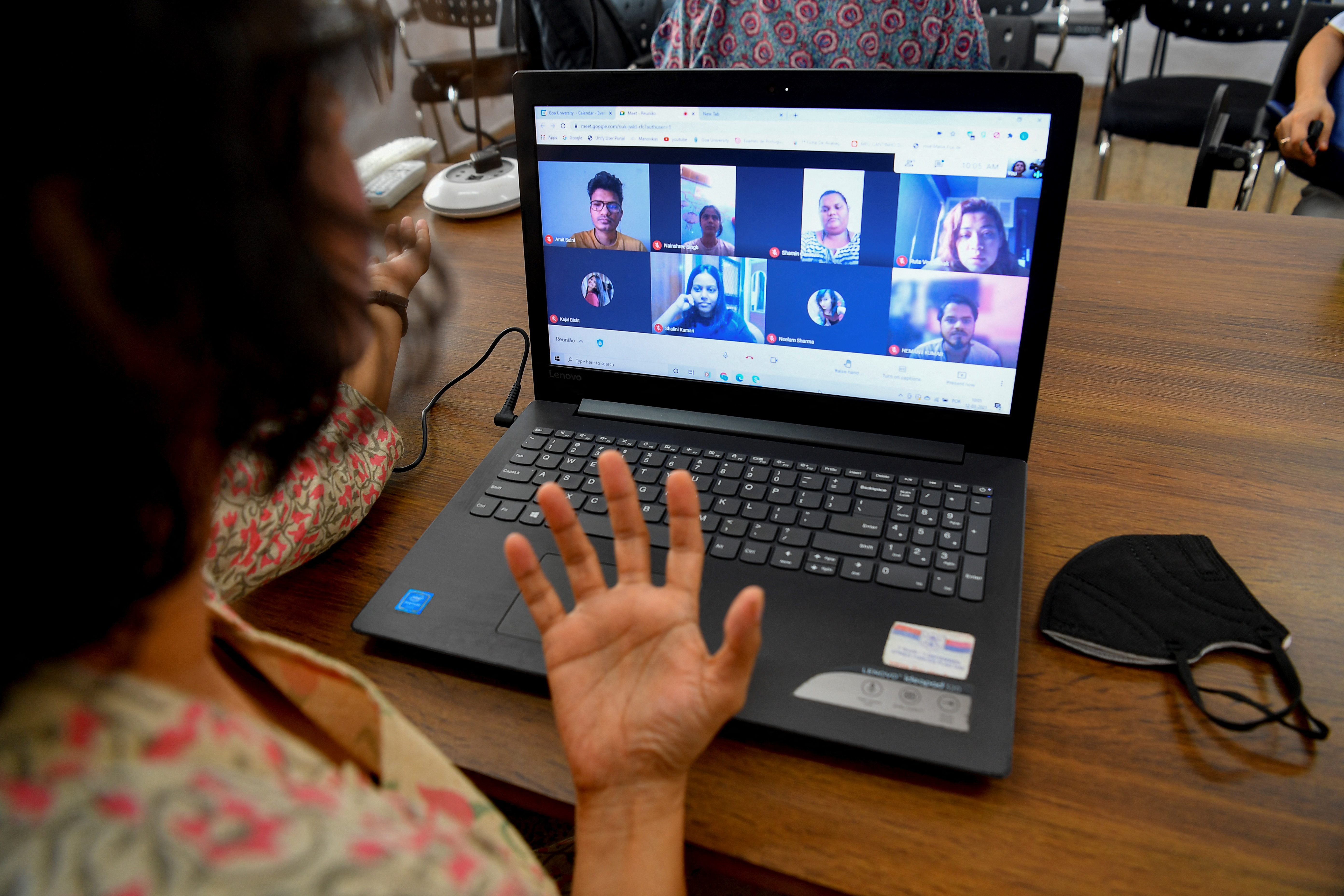 Alberto speaks to her students during an online class at Panaji in Goa
