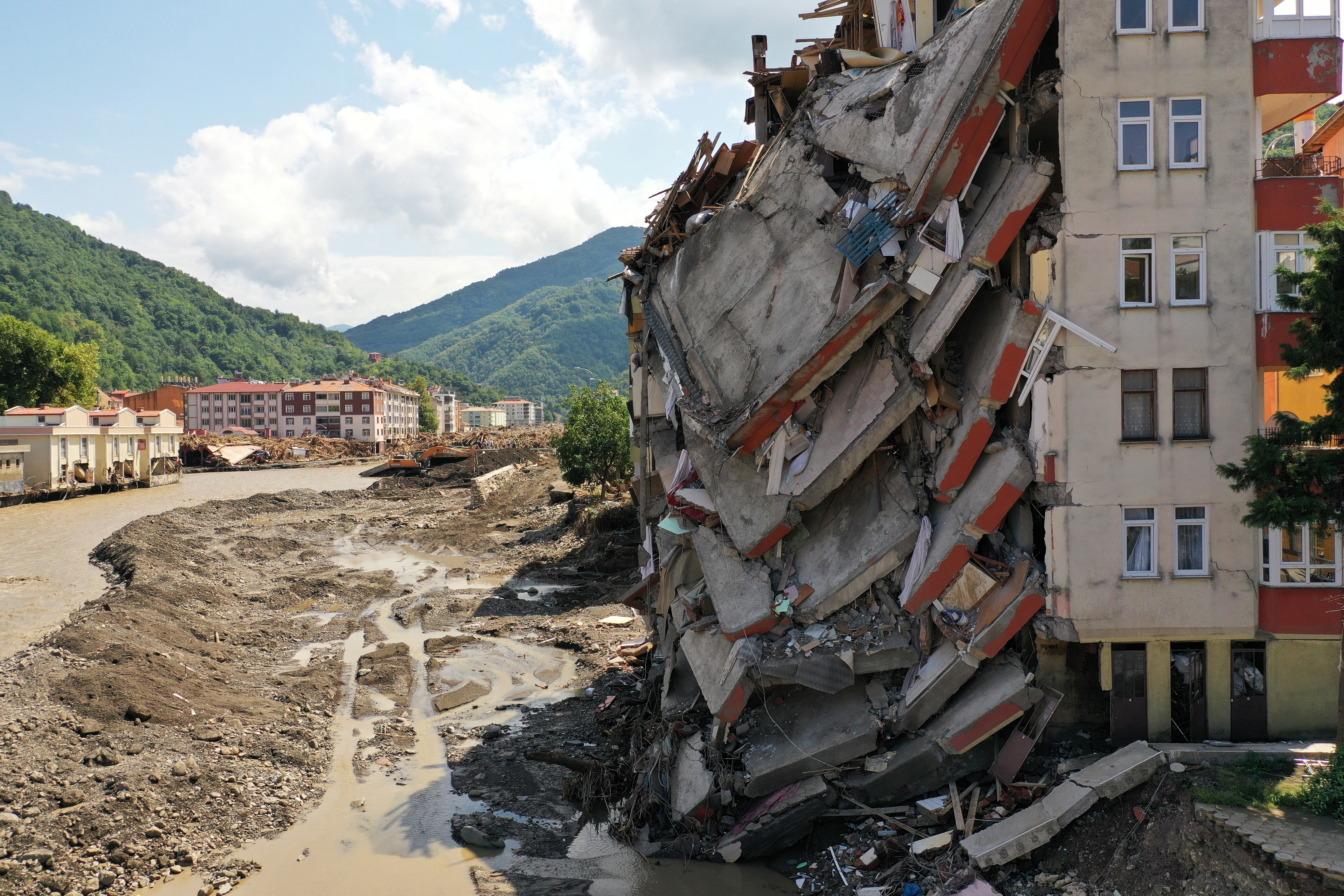 A view shows a partially collapsed building, as the area was hit by flash floods that swept through towns in the Turkish Black Sea region, in the town of Bozkurt, in Kastamonu province, Turke