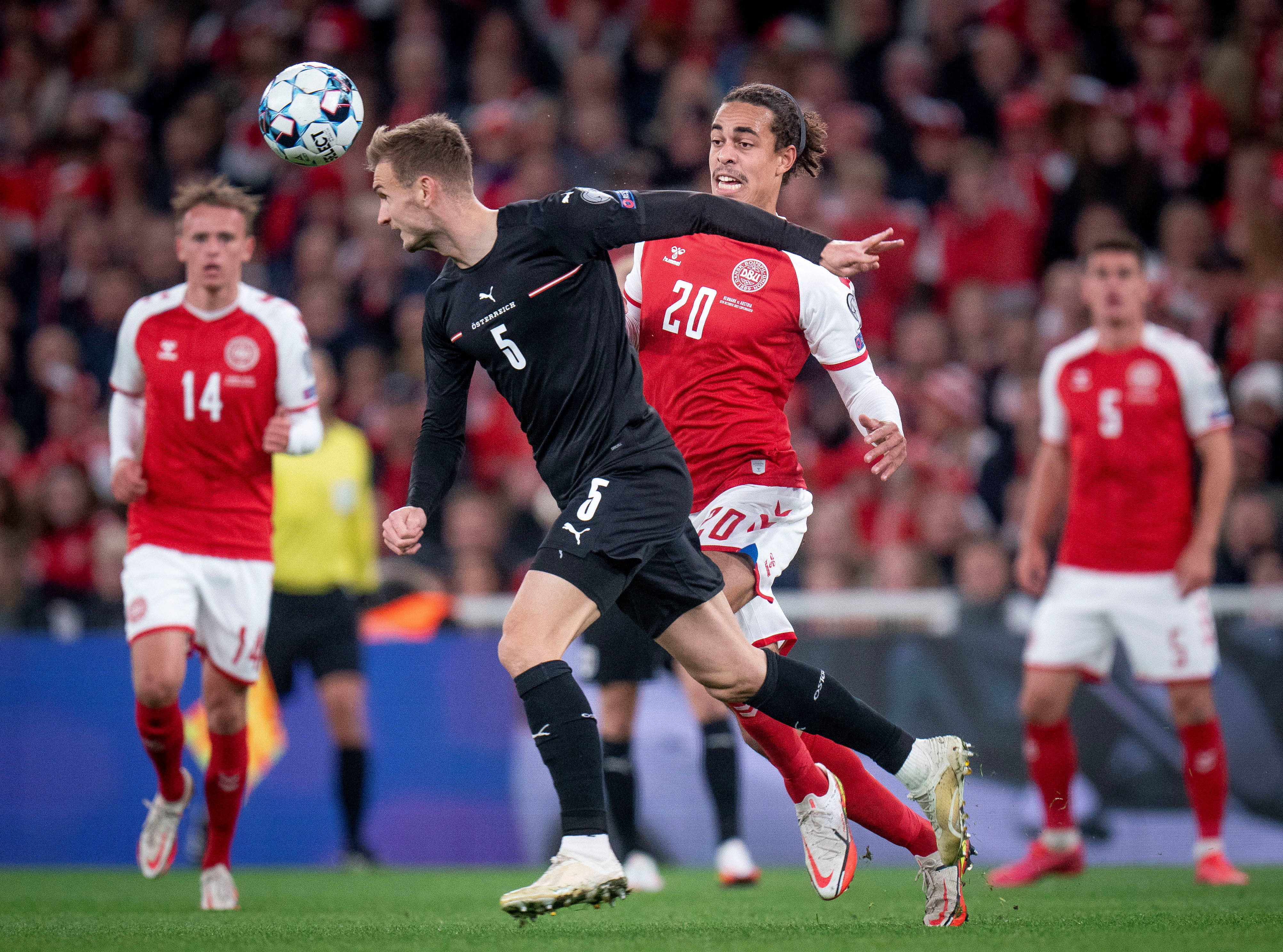 Austria’s Stefan Posch in action with Denmark’s Yussuf Poulsen