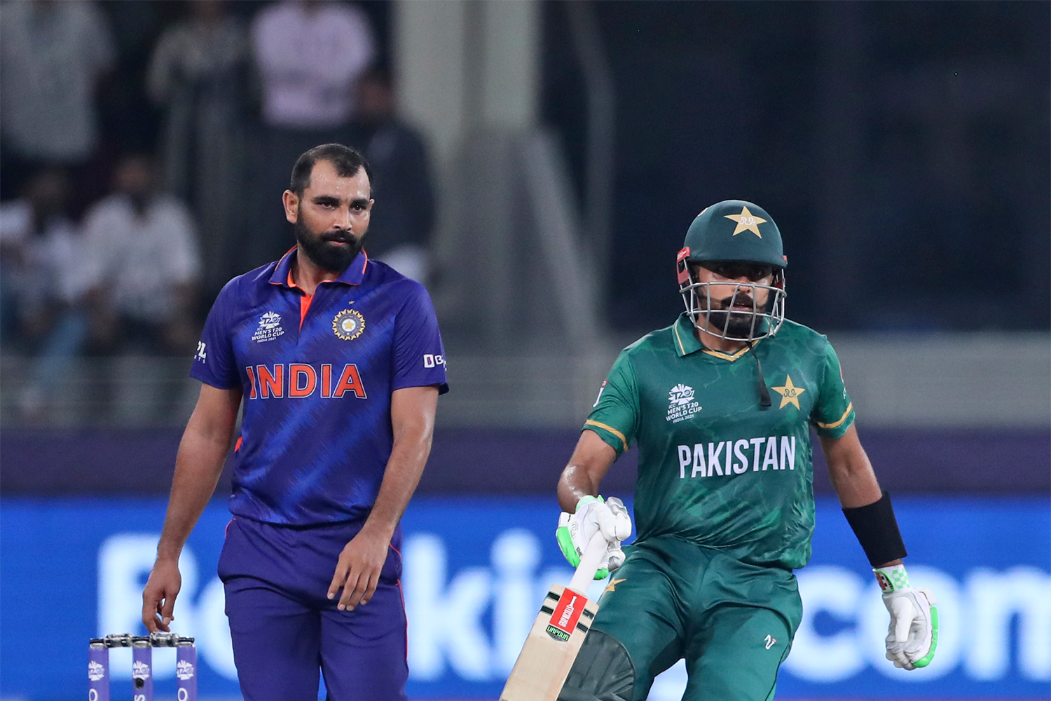 India-Pakistan cricket matches provoke strong reactions in South Asia. This photo shows Mohammed Shami, (left), who faced online abuse after India lost the T20 match