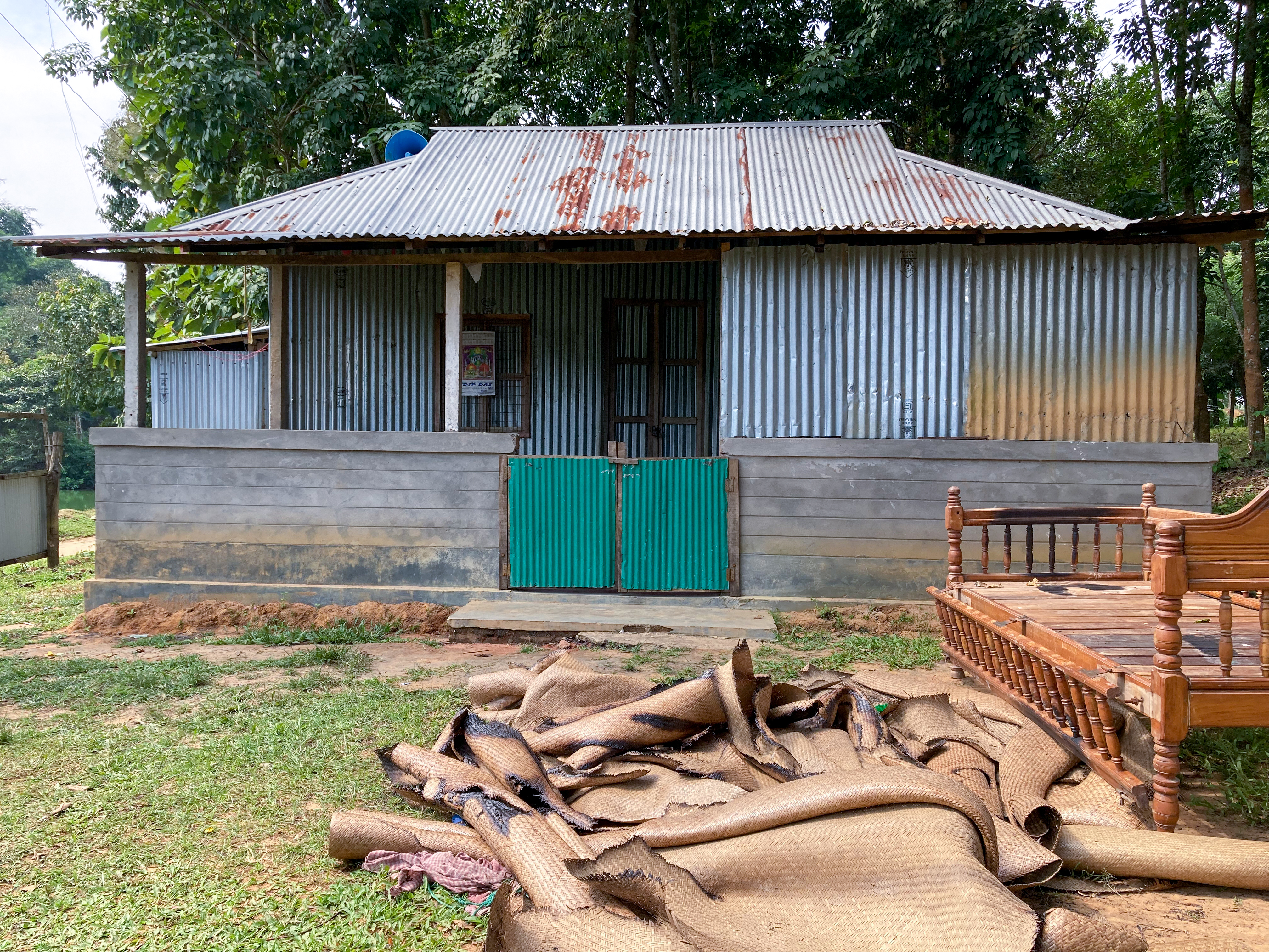 Attackers tried to torch the wooden bier and prayer mats at the small mosque in Naraura, which also serves as a school