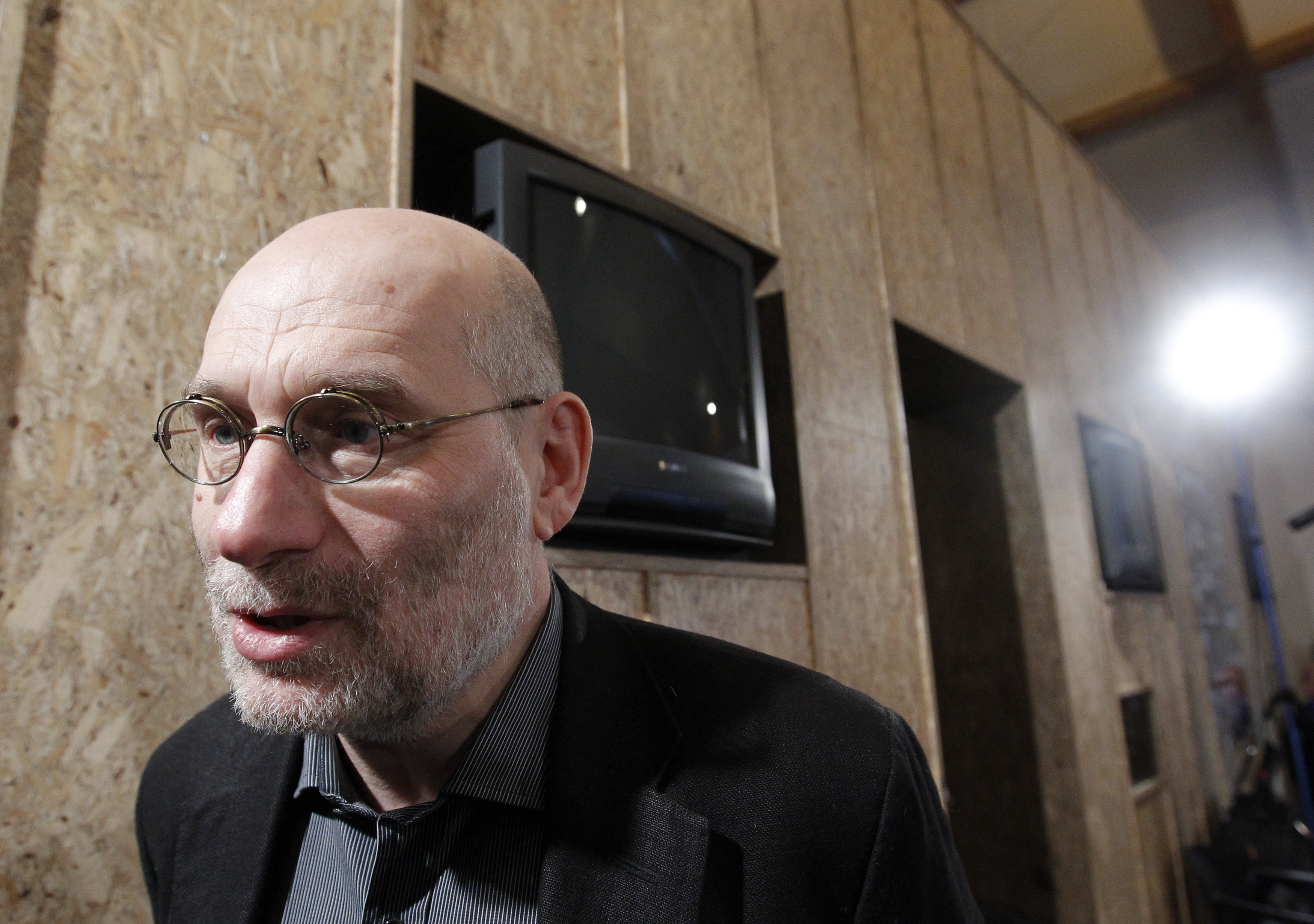 Russian author Boris Akunin gives an interview after a meeting of the organisational committee for a forthcoming opposition protest in Moscow January 31, 2012. The protest, similar to mass protests organised after a parliamentary election in December, is planned for February 4. REUTERS/Anton Golubev (RUSSIA - Tags: POLITICS ELECTIONS)
