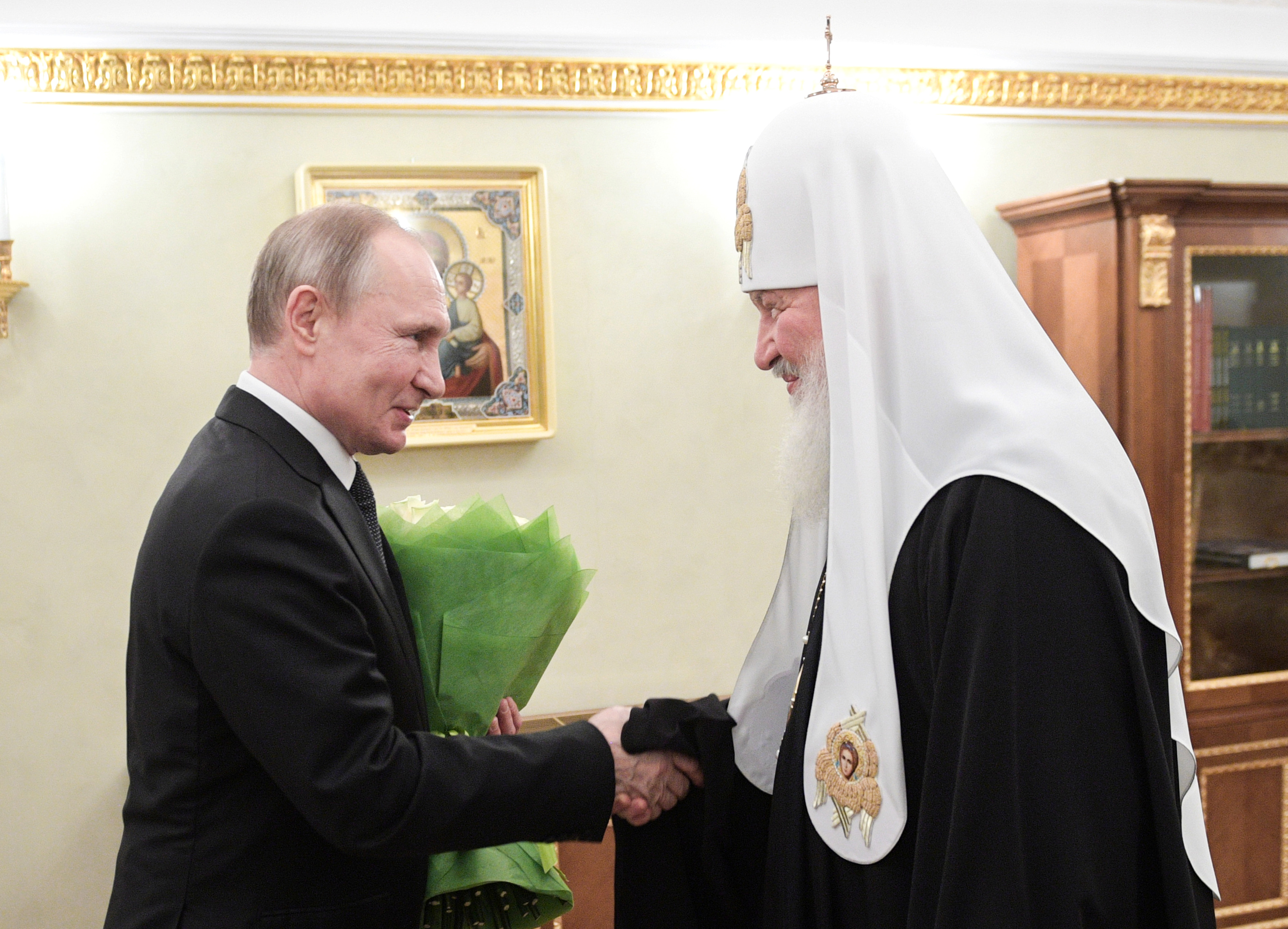 Russian President Vladimir Putin congratulates Patriarch Kirill of Moscow and All Russia in Moscow, Russia.