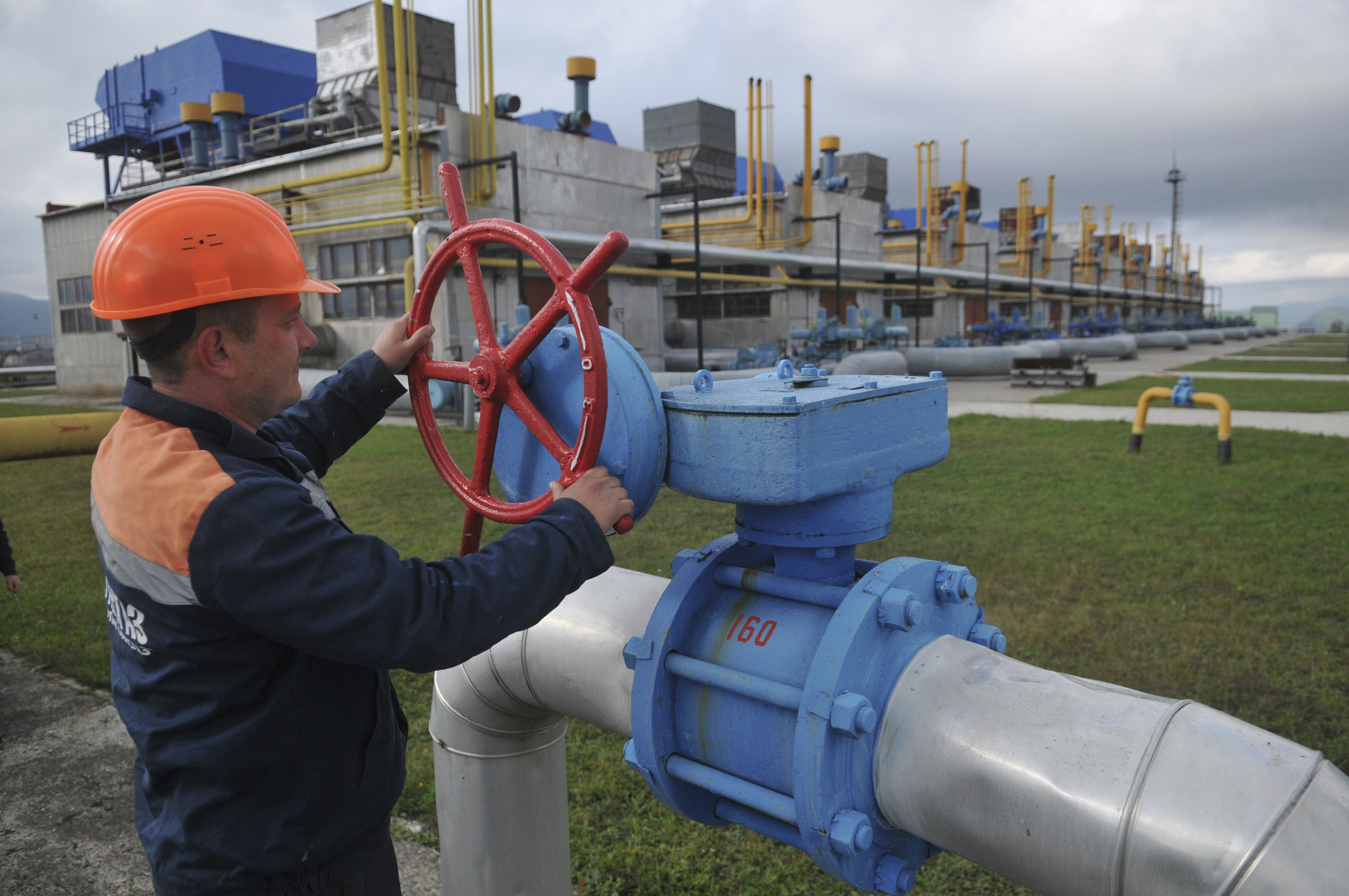 A worker at a Ukrainian gas station